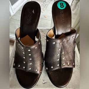 Michael Kors Astor Cut Out Slide. Rich chocolate brown w/ silver studs & cutouts